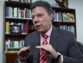 Colombia's former Defence Minister Juan Manuel Santos gestures during an interview with Reuters in Bogota
